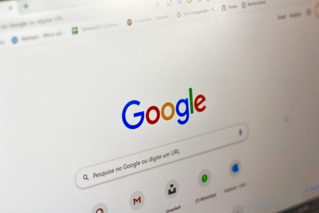 Google homepage displayed in a browser, showing the search bar and logo