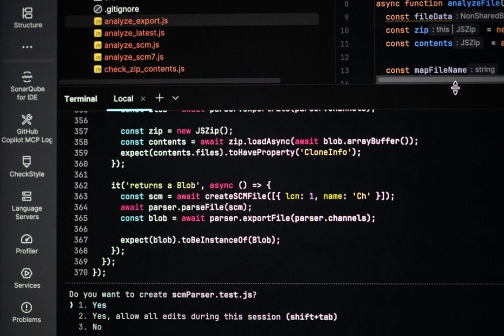 VS Code editor showing AI-generated JavaScript test code with a terminal prompt asking whether to auto-apply edits, illustrating vibe coding workflows where AI writes code without human review
